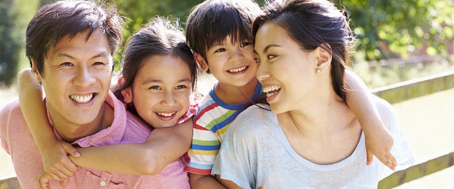Oriental family smiling